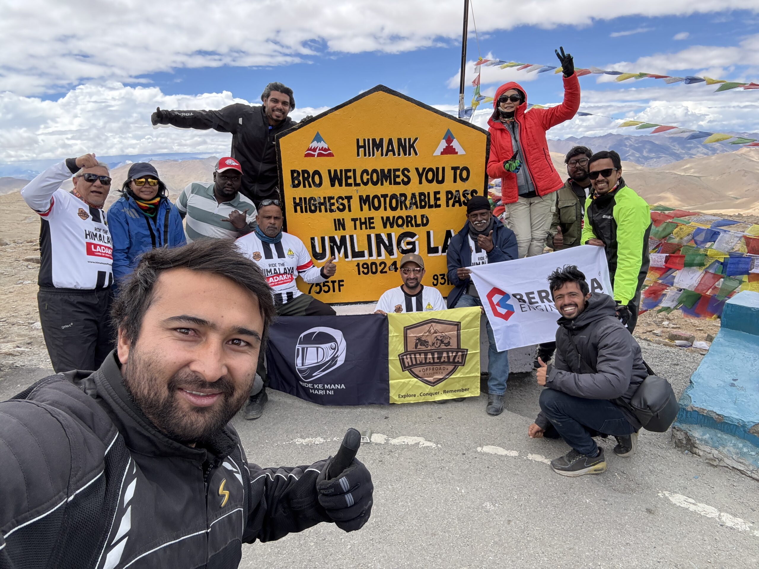 Bikers riding through Ladakh valley landscape