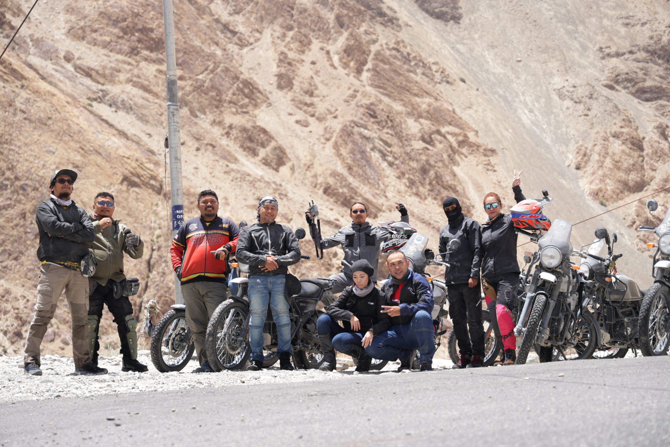 Royal Enfield motorcycle on Ladakh terrain near mountains