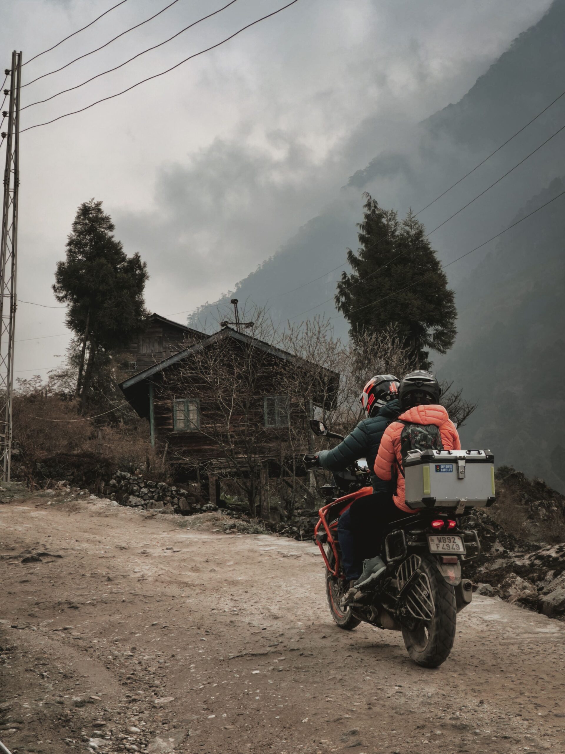 Bikers navigating misty mountain roads in the Northeast
